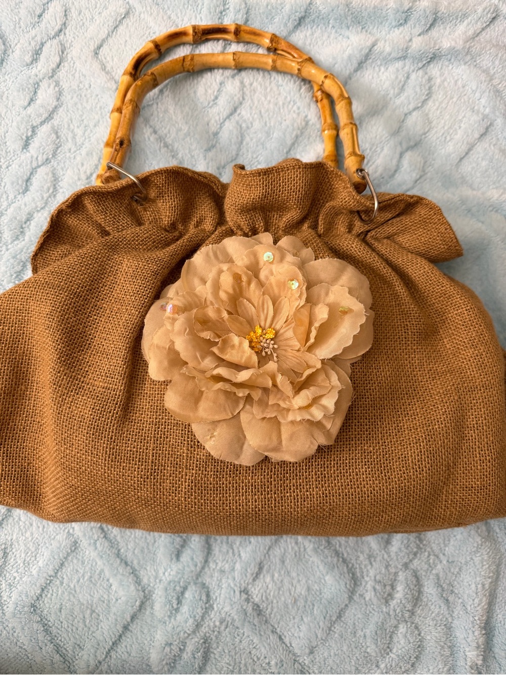 Brown Woven Satchel with Floral Accent and Bamboo Handles